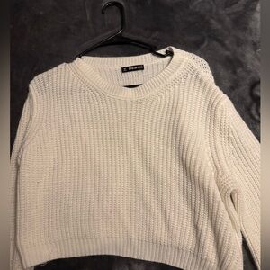 White knitted sweater